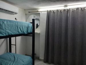 Postel nebo postele na pokoji v ubytování Casa León