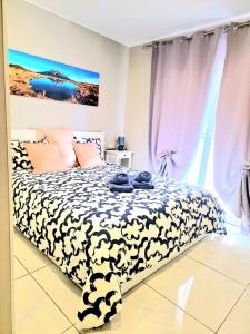Giường trong phòng chung tại Apartamento Nicole en el centro de Alcalá
