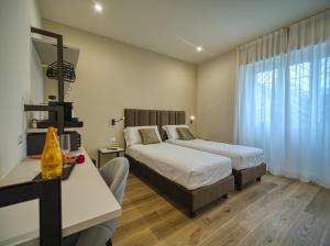 Postel nebo postele na pokoji v ubytování Gioia Guest House