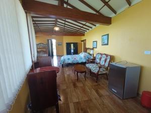 Una televisión o centro de entretenimiento en Mirador Finca Morrogacho