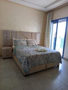 Postel nebo postele na pokoji v ubytování Superbe appartement bord de mer