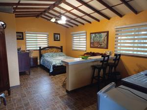 Una cama o camas en una habitación de Mirador Finca Morrogacho