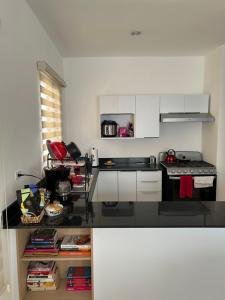 Kuchyň nebo kuchyňský kout v ubytování Habitación privada en casa particular - cama queen size + 8 fotografií