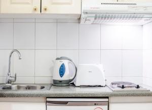 Cucina o angolo cottura di MR Apart Providencia (ex Apart Neruda)