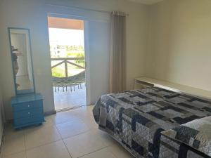 Ένα ή περισσότερα κρεβάτια σε δωμάτιο στο Apartamento Com Ar Cond e WI-FI no Villa das Águas - Praia do Saco +35 φωτογραφίες