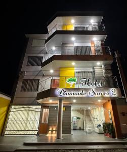 a building with a sign that reads hotel dynamic supreme at Hotel Diamante Sarare 2 in Saravena