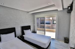 Katil atau katil-katil dalam bilik di Appartement Fes - Golden Luxury Suite