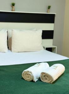 Postel nebo postele na pokoji v ubytování Flats Chamego