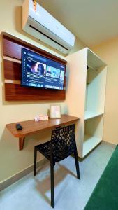 TV a/nebo společenská místnost v ubytování Flats Chamego