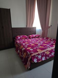 Postel nebo postele na pokoji v ubytování TheZamil's Homestay