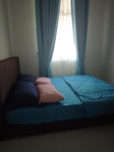 Postel nebo postele na pokoji v ubytování TheZamil's Homestay