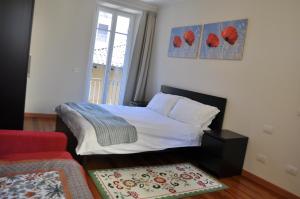 Katil atau katil-katil dalam bilik di Casa Lari Stresa
