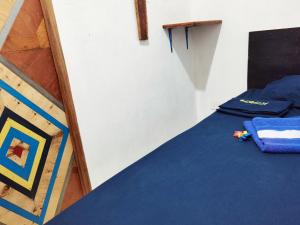 Postel nebo postele na pokoji v ubytování Cabaña Alojamiento Valhalla