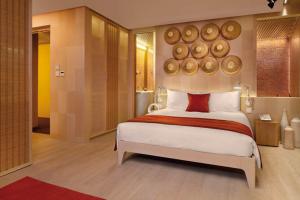 Uma cama ou camas num quarto em Hotel Madera Hong Kong