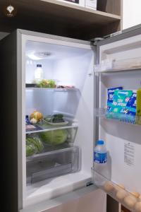 Η κουζίνα ή μικρή κουζίνα στο Opal Luxe Serviced Apartment