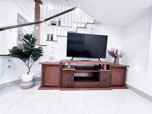 TV a/nebo společenská místnost v ubytování An Nhiên House
