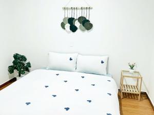 Postel nebo postele na pokoji v ubytování An Nhiên House