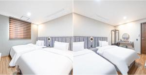 Postel nebo postele na pokoji v ubytování Kaiser hotel