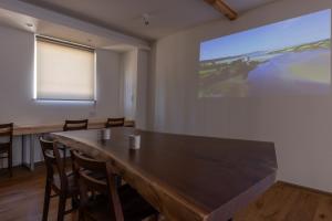 TV a/nebo společenská místnost v ubytování Rinrei terrace 一棟貸切 シングルルーム6部屋 各部屋トイレ シャワー付