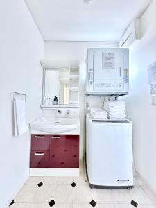 مطبخ أو مطبخ صغير في Modern designed property 15 mins from Kumamoto station by Restavio