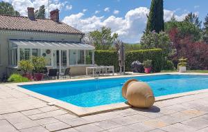 a swimming pool in front of a house at 2 Bedroom Cozy Home In Tabre in Tabre +22 photos