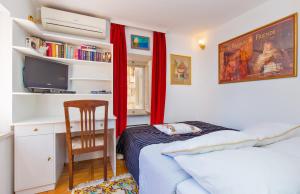Postel nebo postele na pokoji v ubytování Holiday Home Piccolo Mondo
