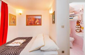 Postel nebo postele na pokoji v ubytování Holiday Home Piccolo Mondo