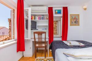 Postel nebo postele na pokoji v ubytování Holiday Home Piccolo Mondo