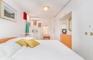 Postel nebo postele na pokoji v ubytování Holiday Home Piccolo Mondo