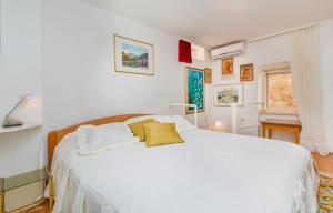Postel nebo postele na pokoji v ubytování Holiday Home Piccolo Mondo