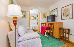 TV a/nebo společenská místnost v ubytování Holiday Home Piccolo Mondo