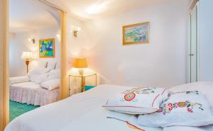 Postel nebo postele na pokoji v ubytování Holiday Home Piccolo Mondo