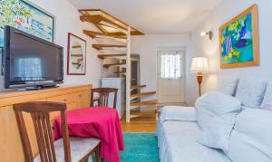 TV a/nebo společenská místnost v ubytování Holiday Home Piccolo Mondo