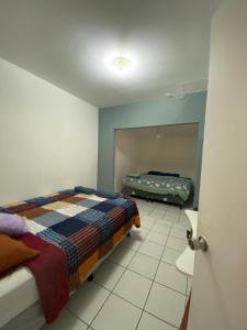 Postel nebo postele na pokoji v ubytování Cozy Home