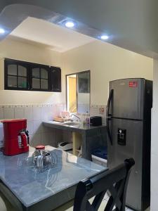 Kuchyň nebo kuchyňský kout v ubytování Cozy Home