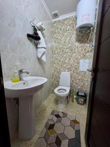 Et badeværelse på Таунхаус в пансионате байтур