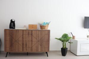 Televiisor ja/või meelelahutuskeskus majutusasutuses Marsaxlokk 2BR Apartment - Quiet Coastal Escape