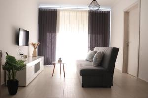 Posezení v ubytování Modern Apartment in Marsaxlokk