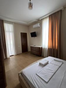 Letto o letti in una camera di Guest House Inn Side