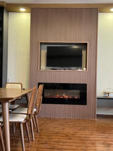 TV a/nebo společenská místnost v ubytování Guest House Inn Side