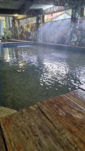 a pool of water in a swimming pool at SKYROCK VILLA in Sungai Lembing
