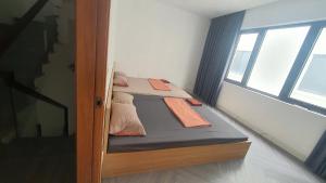 Postel nebo postele na pokoji v ubytování Homestay