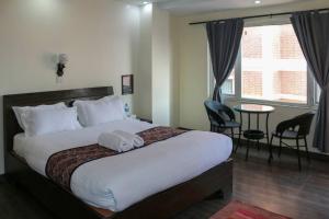 Voodi või voodid majutusasutuse Apartment Hotel 11 Thamel toas