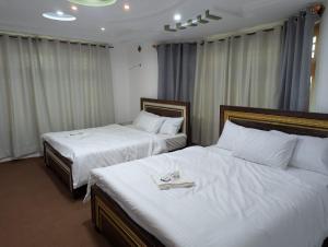 Comfort Hotel & Huts客房内的一张或多张床位