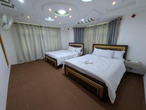 Comfort Hotel & Huts客房内的一张或多张床位