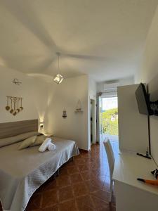 Postel nebo postele na pokoji v ubytování Villa Chiena Forio