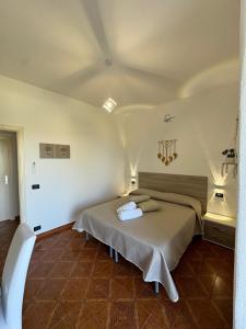Postel nebo postele na pokoji v ubytování Villa Chiena Forio