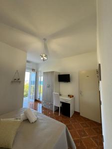 Postel nebo postele na pokoji v ubytování Villa Chiena Forio