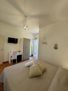 Postel nebo postele na pokoji v ubytování Villa Chiena Forio