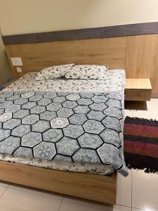 Ένα ή περισσότερα κρεβάτια σε δωμάτιο στο BSR plaza